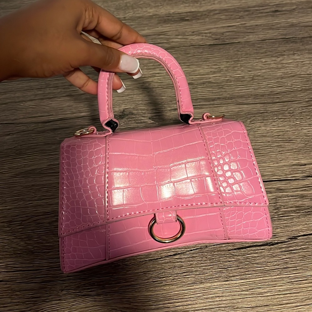 Mini pink purse with handle and attachable strap
